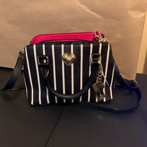 Betsey Johnson Handbags - Betsey Johnson
Mini Faux Leather Satchel